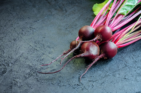 Fresh Ripe Beet on Dark Background. Organic Food. Copy Space For Your Text.