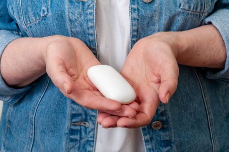 Close-up Woman Keeps Soap in Hands. Most Important Method Anti-Coronavirus.