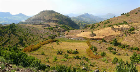 Mountain landscape in Ethiopia. River in the valley of mountains. Africa.