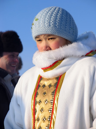Nadym, Russia - March 2, 2007: the national holiday, the day of the reindeer herder in Nadym, Russia - March 2, 2007. Unknown woman - Nenets woman, closeup, on the street.のeditorial素材