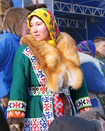 Nadym, Russia - March 11, 2005: the national holiday, the day of the reindeer herder in Nadym, Russia - March 11, 2005. Unknown woman - Nenets woman, closeup, on the street.のeditorial素材