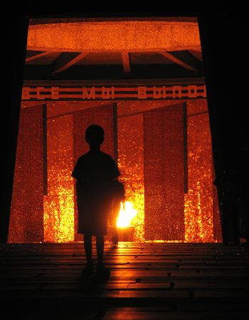 Volgograd, Russia - August 16, 2005: the Church of All Saints on Mamaev hill in Volgograd, Russia - August 16, 2005. Night view. Unknown boy stands at the entrance to the temple.のeditorial素材