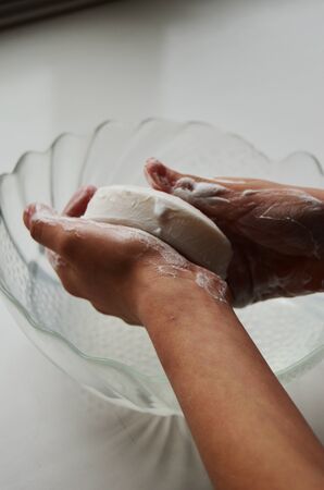 children's hands with soap washes hands soapの写真素材