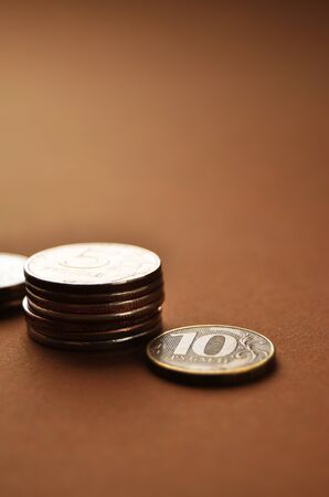 stack of coins close-up vertical orientation