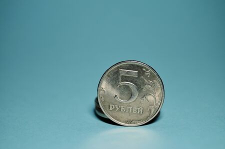 iron coin close-up on a mint background horizontal orientation