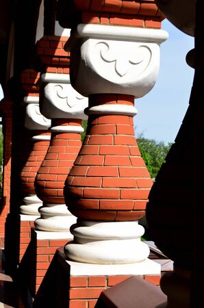 columns of red and white brick in one row vertical orientationの写真素材
