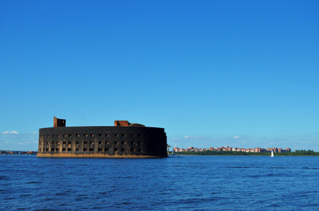 Fort Marine Military historic black from a fire in the Gulf of Finland near Kronstadt. Russia, St. Petersburg, 17.08.2020のeditorial素材