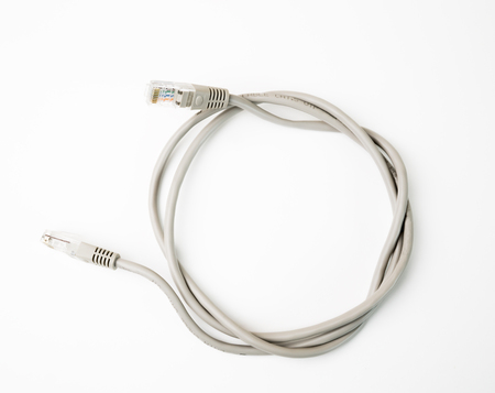 Patch cord grey network cable with molded RJ45 plug, isolated on a white background