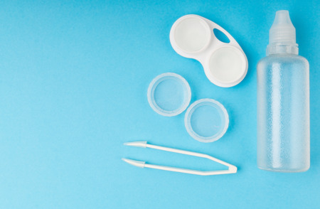 Contact lenses set with contact lenses saline in bottle, contact lenses tweezers, contact lenses plastic case with solutionの写真素材