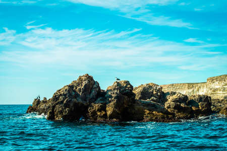 Cape Tarkhankut in summer in sunny weather. Crimea, Russia. tourism, beautiful beaches. mountains,...
