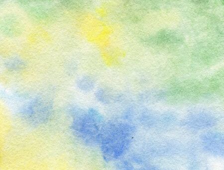 Watercolor hand painted abstract Yellow green blue background. Subtle ink gradient on textured paper. Creative aquarelle painted spring colors canvas for splash design, invitation, vintage templateの写真素材