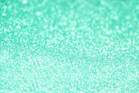 Christmas background and new year concept, abstract defocused light background with bokeh and blur, green. Winter banner for your text, background image or layer for overlay in the photo editor, out of focusの写真素材
