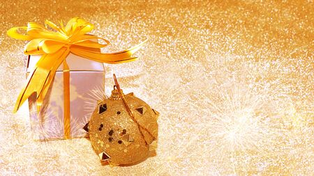 Christmas or New Year background with gift box on the background of Christmas decorations and bright bokeh, selective focus, place for text, banner, New Year card. Preparation for a happy congratulation, festive atmosphereの写真素材