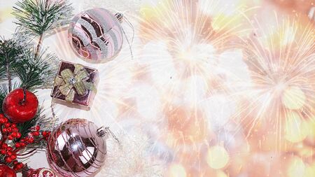 Christmas or New Year background with gift box on the background of Christmas decorations and bright bokeh, selective focus, place for text, banner, New Year card. Preparation for a happy congratulation, festive atmosphereの写真素材