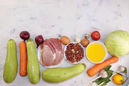 Vegetable and protein foods on a light background, a balanced diet of the Atkins diet, the goal of which is to lose weight by avoiding carbohydrates and controlling insulin levels,の写真素材