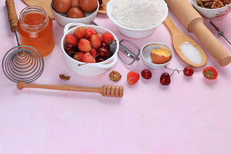The recipe for making strawberry cherry pie. Eggs, flour, Sazar, strawberries and honey, top view,...