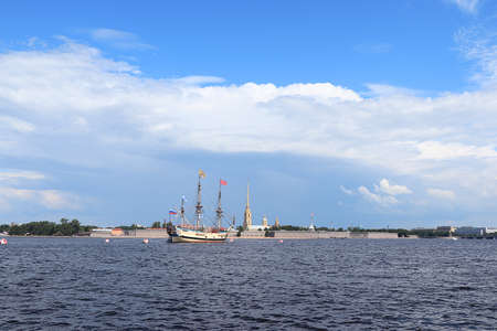 Russia, St. Petersburg, July 19, 2020. Military brig Poltava and the Peter and Paul Fortress in the...