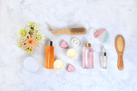 Spa ingredients with fragrant wild orchid flowers for skin and body care, rose water and cream,...