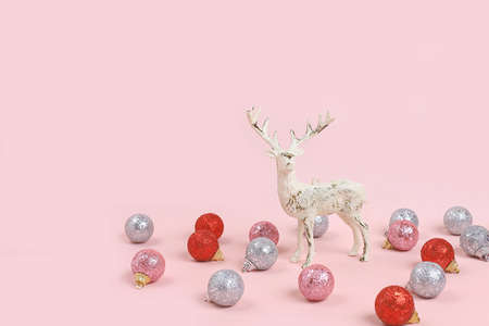 Christmas composition with decorations and toys, postcard, minimal holiday concept, modern new year background, banner for screen, place for textの写真素材