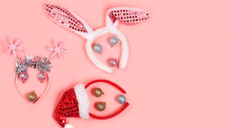 Christmas composition with decorations and toys, greeting card, minimal holiday concept, modern new year background, banner for the screen, space for text,の写真素材