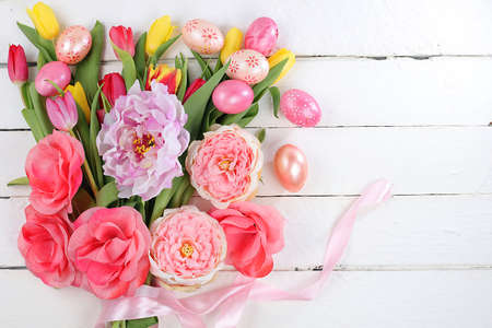 Happy Easter concept, spring card, composition with flowers and eggs on a gentle background. Festive minimal concept, place for text, banner for screen,の写真素材