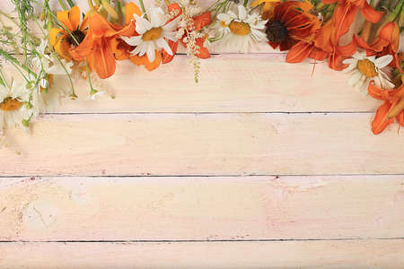 Abstract floral composition with place for text, still life, autumn banner, lilies and chamomile on...