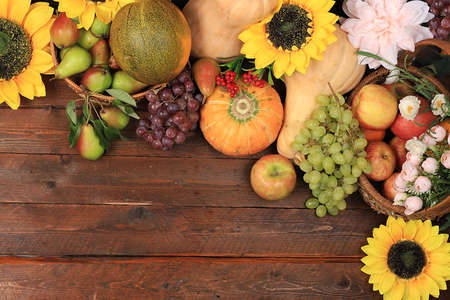 Happy Thanksgiving concept, autumn background with seasonal fall nature berries, pumpkins, melons,...