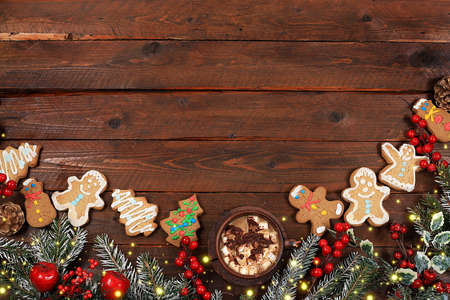 Christmas new year food, traditional gingerbread, cup of cocoa with marshmallows and homemade cookies with fir branches, cones and decorations, dish design idea, bakery concept, holiday background or postcard, selective focus,の写真素材