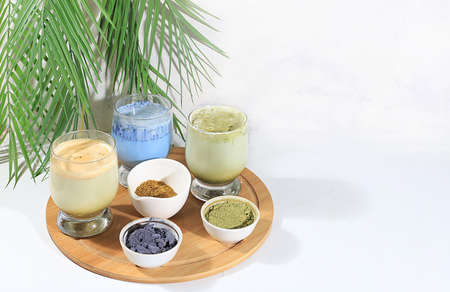 Assortment of colorful Japanese tea latte with milk, green, blue, pink moon milk, golden milk....