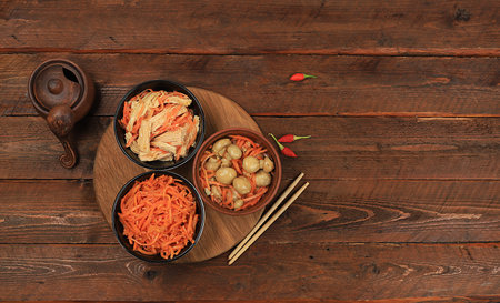 Korean side dishes for bbq dinner - kimchi and various types of vegetables, a set of fermented foods...