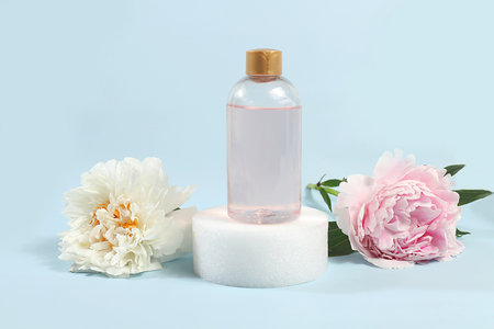 Spa and wellness composition with fragrant rose water and peony and rose flowers, aromatherapy and skin care, lifestyle and organic cosmetics concept, salon invitation and advertisement, selective focusの写真素材