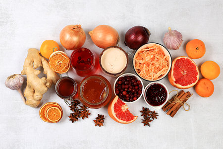 Healthy natural products with vitamin C for flu and colds. Select fresh fruits and vegetables and natural ingredients to strengthen the immune system. Organic virus protection, selective focus.の写真素材