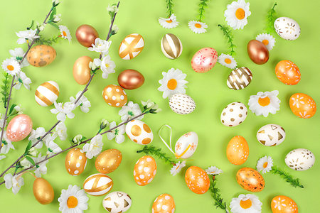 Abstract Easter composition,spring banner with sakura flowers and painted eggs,Easter holidays concept,greeting card and template for design,selective focusの写真素材