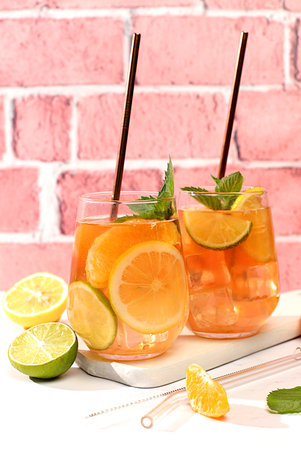 Tropical cocktail with chia seeds, lime, lemon, mint and apricots. Summer party and healthy lifestyle advertising. Menu for cafe and restaurantの写真素材