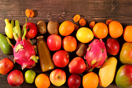 Banner with tropical exotic fruits on concrete background, summer vacation and healthy lifestyle...