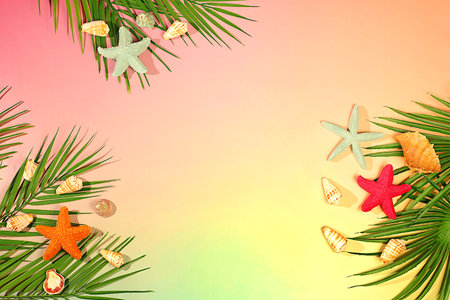 Tropical sunny colorful banner,Abstract background with palm leaves,seashells,and stars.Elegant beautiful podium and template for your creativity,summer party concept and product display stand.の写真素材