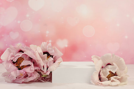 Empty podium with spring mountain peony flowers.Abstract floral arrangement with peonies, banner. Creative template for your design.Minimal modern aesthetics, elegant beauty concept,の写真素材