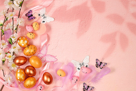 Happy Easter concept. Abstract spring Easter composition with pink painted eggs, feathers,...