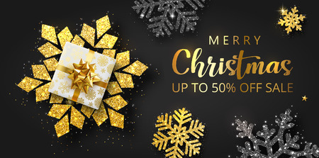 Black Merry Christmas sale promo poster with top view gift and shiny snowflakes. Up to 50% off. Vector background.のイラスト素材