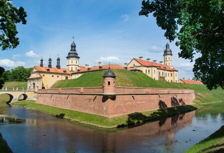 Medieval castle and moat around it in Nesvizh, Belarus.のeditorial素材
