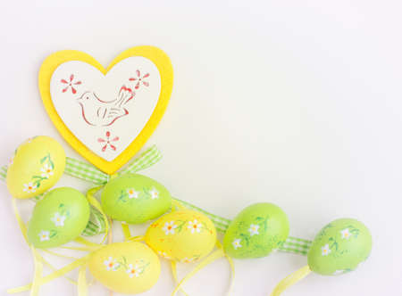 Easter pastel eggs on white background. Top view.の写真素材