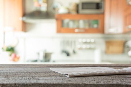Blurred background. Modern kitchen with tabletop and space for you.の写真素材