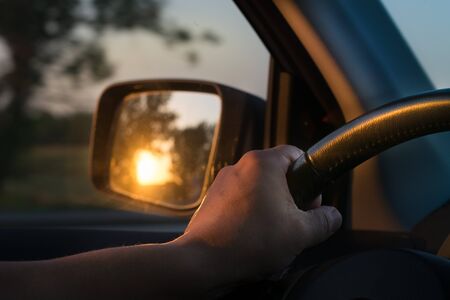 Early in the morning journey by car.