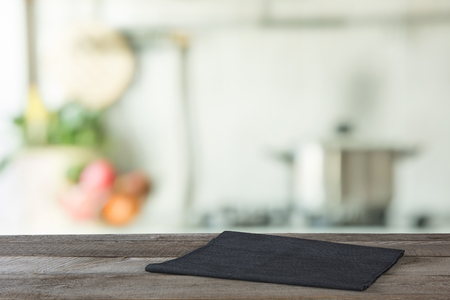 Blurred background. Modern kitchen with tabletop and space for you.の写真素材