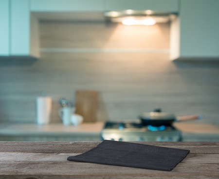 Blurred background. Modern kitchen with cooking on gas and space for you. Toned image.の写真素材