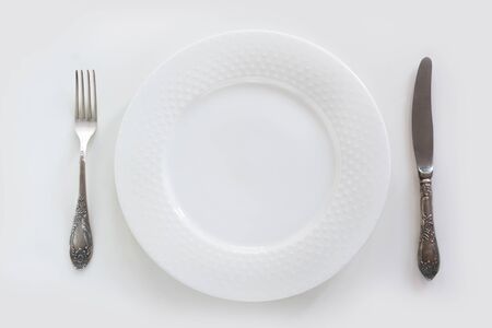 Elegance table setting with on white background. Top view.の写真素材