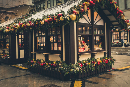 MOSCOW, RUSSIA - DECEMBER 24, 2017: Christmas fair in the street Kuznetsky most. Traditional annual Moscow Festival Journey to Christmas. Moscow decorated for Christmas holidays.のeditorial素材