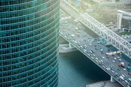 Aerial view from Federation Tower Moscow City. View to highway. Urban pattern. Night and sunset in...