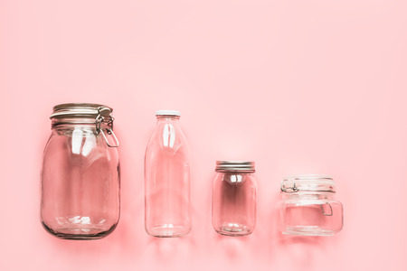 Set of jars on pink background for zero waste storage and shopping. View from above with copy space.の写真素材