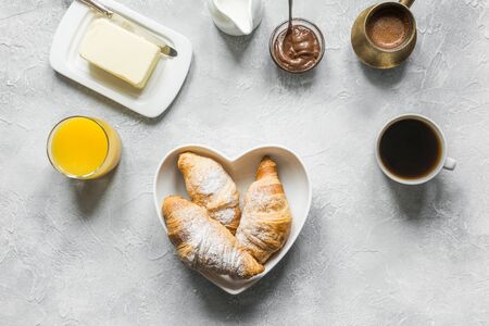 French breakfast with black coffee, freshly croissant, chocolate, butter. Top view. Flat lay. Continental breakfastの写真素材